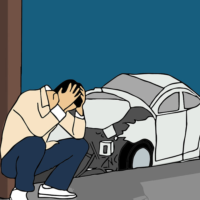 cartoon auto accident with a man crouches and buries head in hands